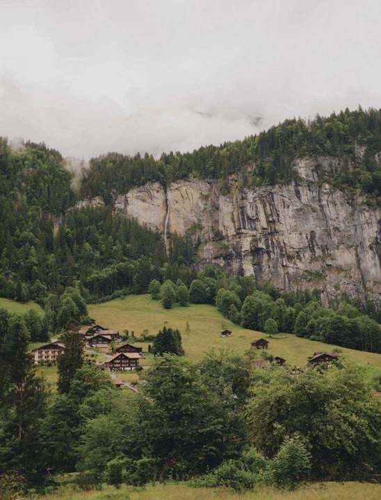 An alpine village beneath the cliffs of Lauterbrunnen, Switzerland